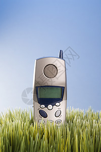 草地上的无线电话电话讲话照片固定电话背景图片