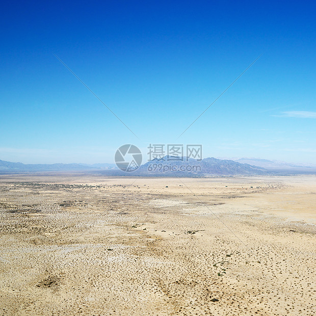 沙漠和山岳灰尘干旱鸟瞰图山脉地平线天线旅行热带照片图片