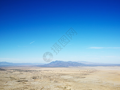 沙漠和山岳地平线照片鸟瞰图山脉热带干旱旅行天线灰尘图片