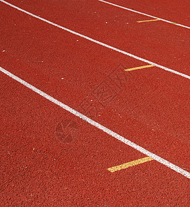 轨道和字段竞争古铜色白色场地金子勋章竞赛运动跑步火车背景图片
