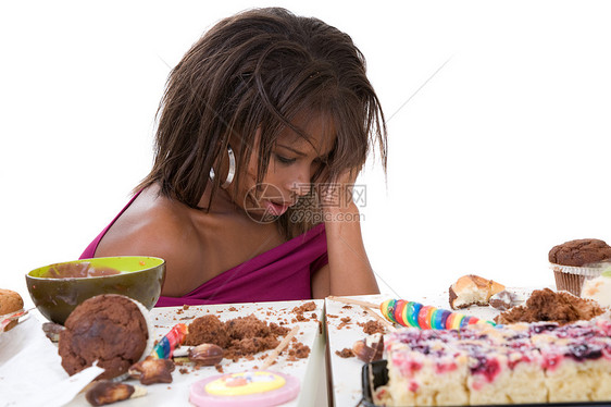 她肚子病得恶心贪婪饮食糖果营养巧克力食物女孩女士女性多样性图片