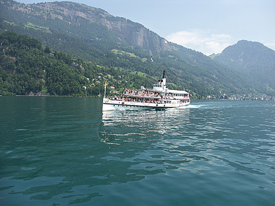 船渡船旗帜旅行运输发动机海浪游艇海洋活动巡航图片