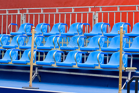 蓝椅运动蓝色红色论坛政治体育场摊位背景图片