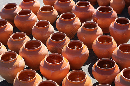 棕土锅手工棕色工作石器手工业材料塑像黏土陶器背景图片