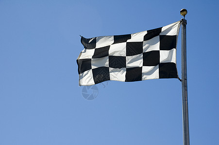旗帜飘扬在极上检查的完成线旗帜背景
