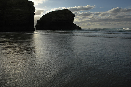 海滩沙滩岩石悬崖砂岩橙子反射风景旅行国家镜子水库图片