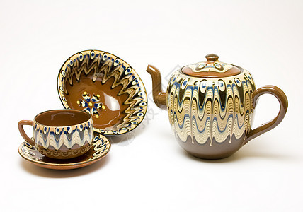 古老的茶壶和杯子陶器文化健康闲暇陶瓷茶馆饮料白色血管传统图片