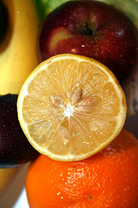 柑橘红色李子香蕉晴天黄色太阳橙子水果紫色图片
