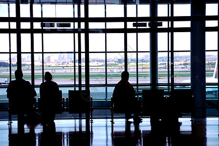 人民机场剪影假期人群过境运输女士航班夫妻商业旅行者图片