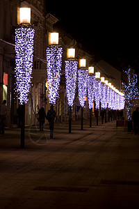 灯光柱一行假期人行道灯柱建筑城市广场背景图片