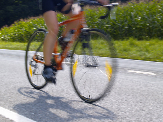 自行车公路比赛运动赛车手街道图片