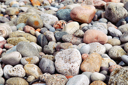 海滩石块银行圆形石头沿海尺寸巨石海岸鹅卵石支撑碎石背景图片