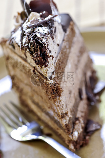 巧克力蛋糕切片食物育肥冰镇巧克力款待磨砂咖啡店鞭打面包盘子图片