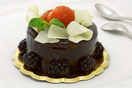 巧克力蛋糕棕色薄荷水果诱惑食物巧克力绿色晚餐叶子糕点图片