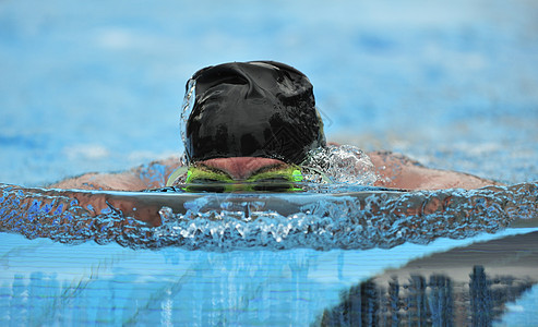 游泳运动员游泳者风镜运动游泳池蛙泳男人海浪背景图片