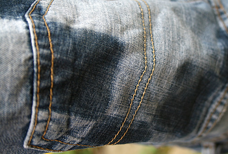 牛仔裤口袋牛仔布棉布材料服装纺织品衣服织物蓝色裤子图片