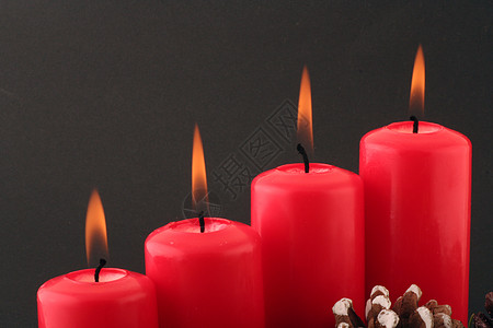 修道院红色坚果松果庆祝花生蜡烛维生素基督火焰食物背景图片