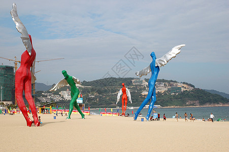 海边的天使雕塑天空翅膀飞行安全海滩图片