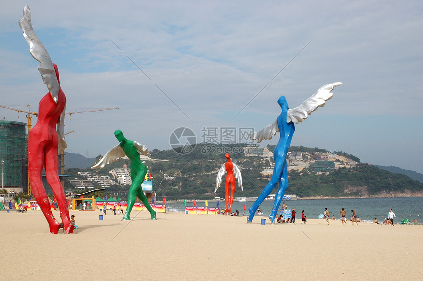 海边的天使雕塑天空翅膀飞行安全海滩图片