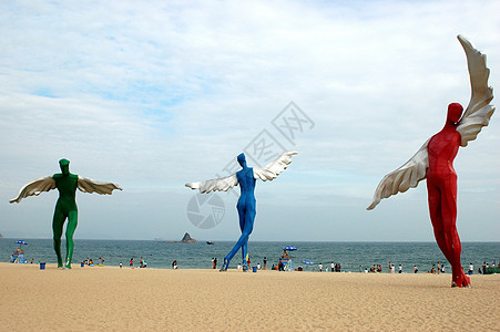 海边的天使海滩雕塑安全天空飞行翅膀图片