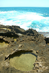 和波多黎各的海浪摄影岩石里科游客天空旅游海湾冲浪洞穴图片