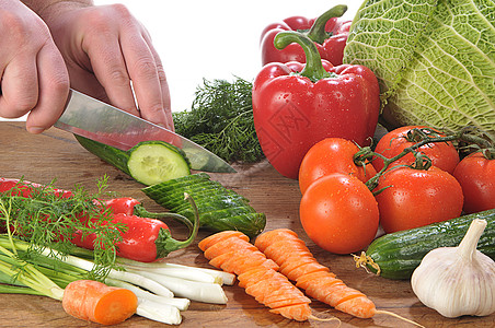 切刀切手辣椒绿色水滴胡椒食物木板黄瓜红色水平蔬菜图片