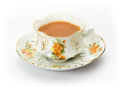 茶在古老的骨瓷杯里图片