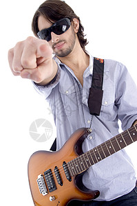 年轻摇滚明星弹吉他男人乐器旋律工作室音乐家岩石音乐冒充娱乐吉他图片