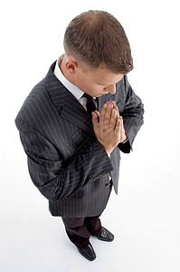 祈祷商务人士的高角度视图图片