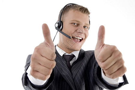 年轻商务人士举起拇指工作室男人服务老板姿势成功提供者交易耳机会计图片