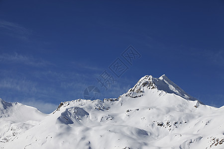 下雪山脉太阳高度高山运动滑雪阴霾蓝色单板冻结暴风雪图片