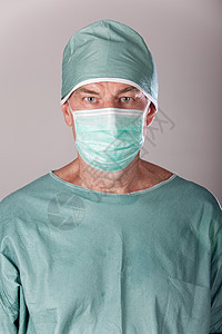 男性外科医生保健医疗药品绿色男人卫生手术灰色面具背景图片