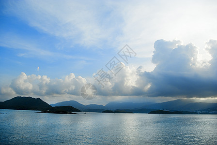 云水瑶土楼蓝蓝天空日光太阳假期蓝色旅行海浪海景阳光背景