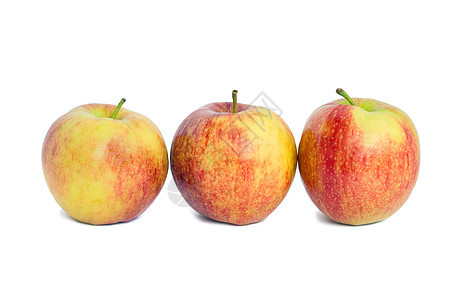 三个红苹果红色照片食物白色黄色静物背景图片