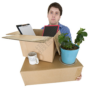 男子在其他办公室的调动包装商务杯子植物盒子旅行白色棕色花盆男性图片