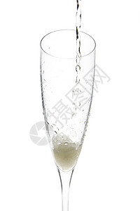 香槟玻璃庆祝会泡沫新年干杯杯子宏观酒精奢华火花飞溅生日背景图片