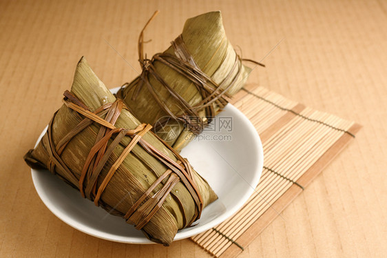 大米月球陶器杯子棕色风俗食物节日叶子粽子午餐图片