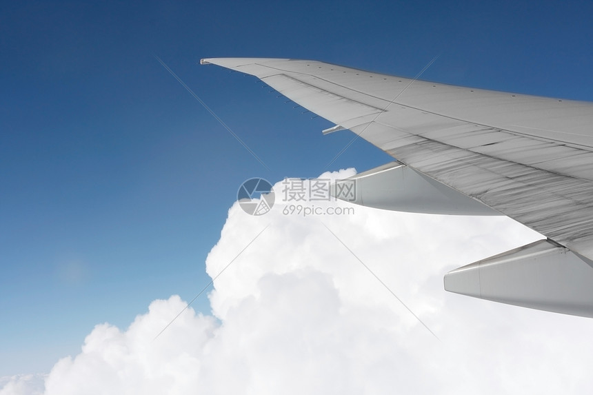 连翼乘客旅行飞行晴天窗户海洋翅膀舷窗蓝色天气图片