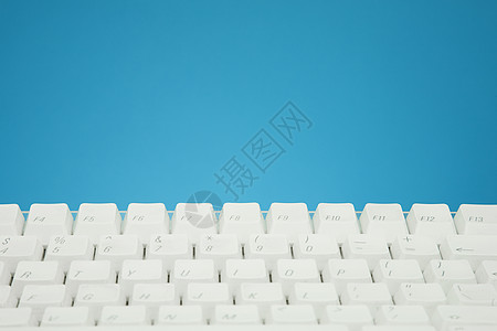 白苹果计算机键盘背景图片