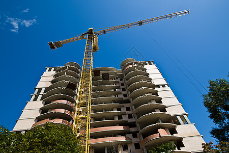 正在建造工地起重机城市建筑天空绞刑架背景图片