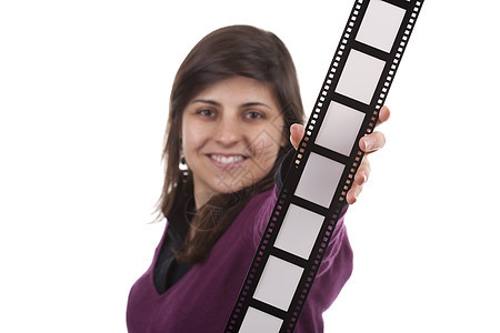 持有电影照片框的年轻女子 在白色后腹号上被孤立乐趣女孩女性边界框架女士回忆相机微笑商业图片