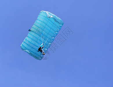 蓝降落伞滑行爱好自由行动闲暇段落冒险活动蓝色运动图片
