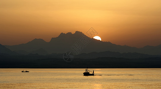 埃及日落反射场景气候蓝色太阳巨石海浪发动机海滩阳光图片