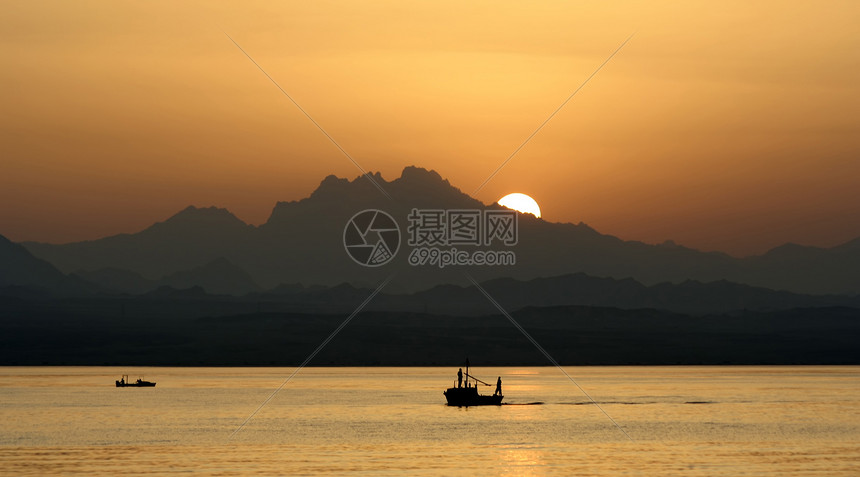 埃及日落反射场景气候蓝色太阳巨石海浪发动机海滩阳光图片