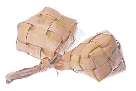 粢饭糕孤立的稻田大米马来语小袋树叶午餐煮沸宏观食物美味棕榈编织背景