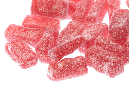 孤立无援软糖宏观食物大枣糖果红色粉色糖衣图片