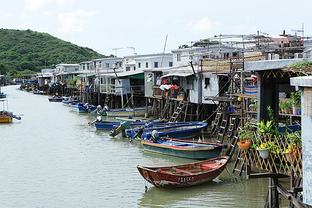 Taa O渔村天空房子住宅窝棚蓝色村庄旅行场景棚户区钓鱼图片