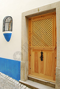 当地村典型的房屋细节建筑房子木头建筑学蓝色入口框架风格装饰住宅图片