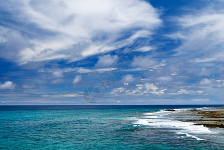 珊瑚礁岩石角天空热带天堂海岸旅行海浪游客旅游沿海珊瑚图片