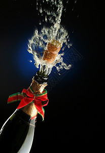 香槟酒已经准备好庆祝了嘶嘶酒杯金子纪念日瓶颈派对气泡软木乐趣干杯背景图片